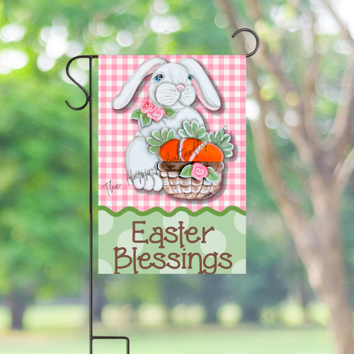 Bunny in Basket Garden Flag displayed in a yard, perfect for Easter and springtime decor.