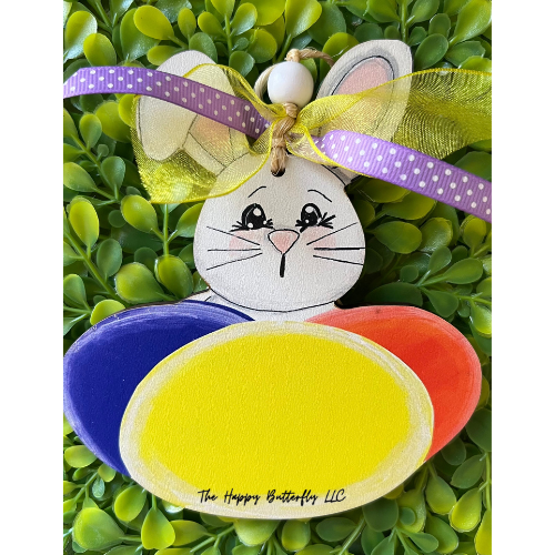 Personalized bunny ornament with a durable rope for easy hanging.